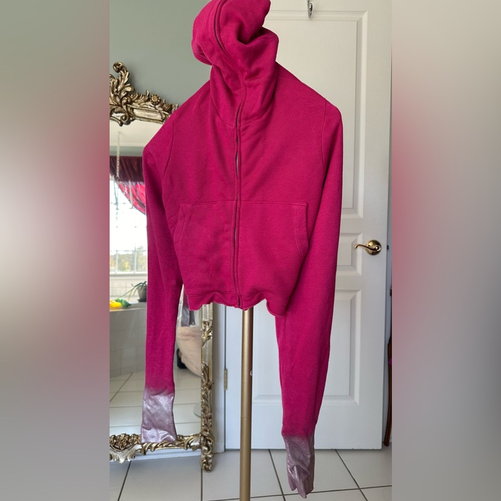 New with tagsSoft and gorgeous deep pink coat with long zipper.